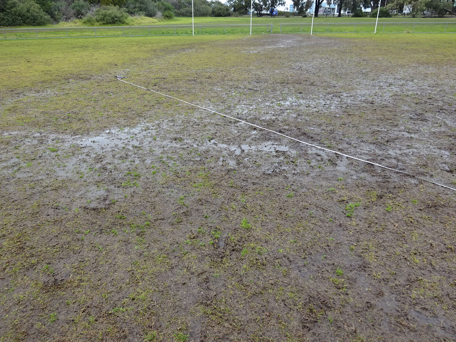 Damaged natural turf Field of Play during the winter season