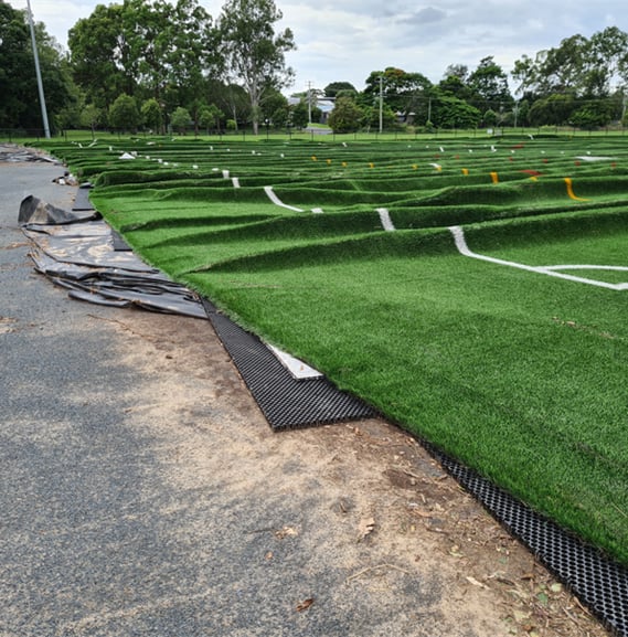 Long pile synthetic turf Field of Play surface being damaged by flood